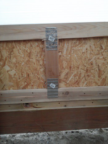 Greenhouse door joints re-enforced with tie plates