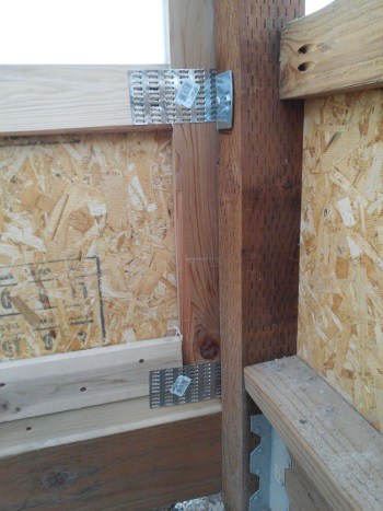 Greenhouse door joints re-enforced with tie plates