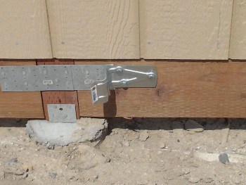 Greenhouse sliding barn door bumper