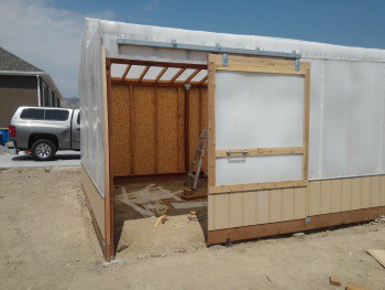 Greenhouse sliding barn door