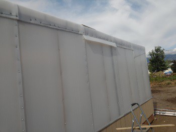 Trimming the greenhouse roof line