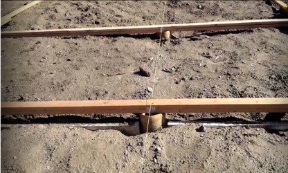 Laying footings for the greenhouse